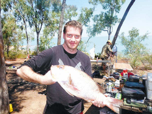 Photo of Matt Osborne with a Golden Snapper