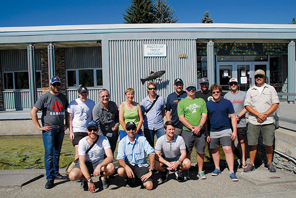 Photo of the bursary group gathered in front of the Kootenay Trout Hatchery