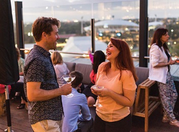 Photo of people at a bar