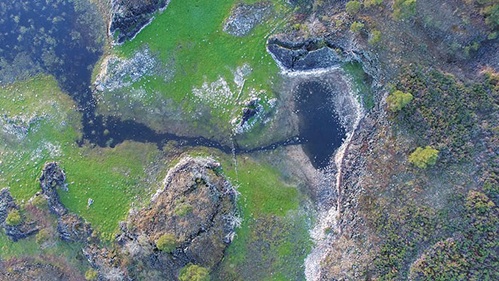 Photo of Tae Rak channel and holding pond from above