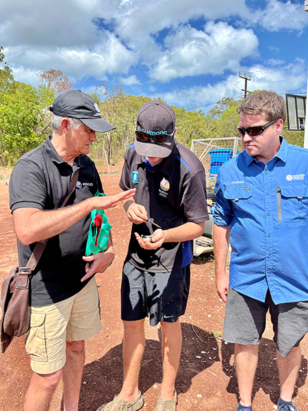 Photo of Oyster inspection - FRDC’s Wayne Hutchinson (left) with, Brandon Wisley of Yagbani Aboriginal Corporation and Matt Osborne of the Department of Primary Industry and Resources, NT.  