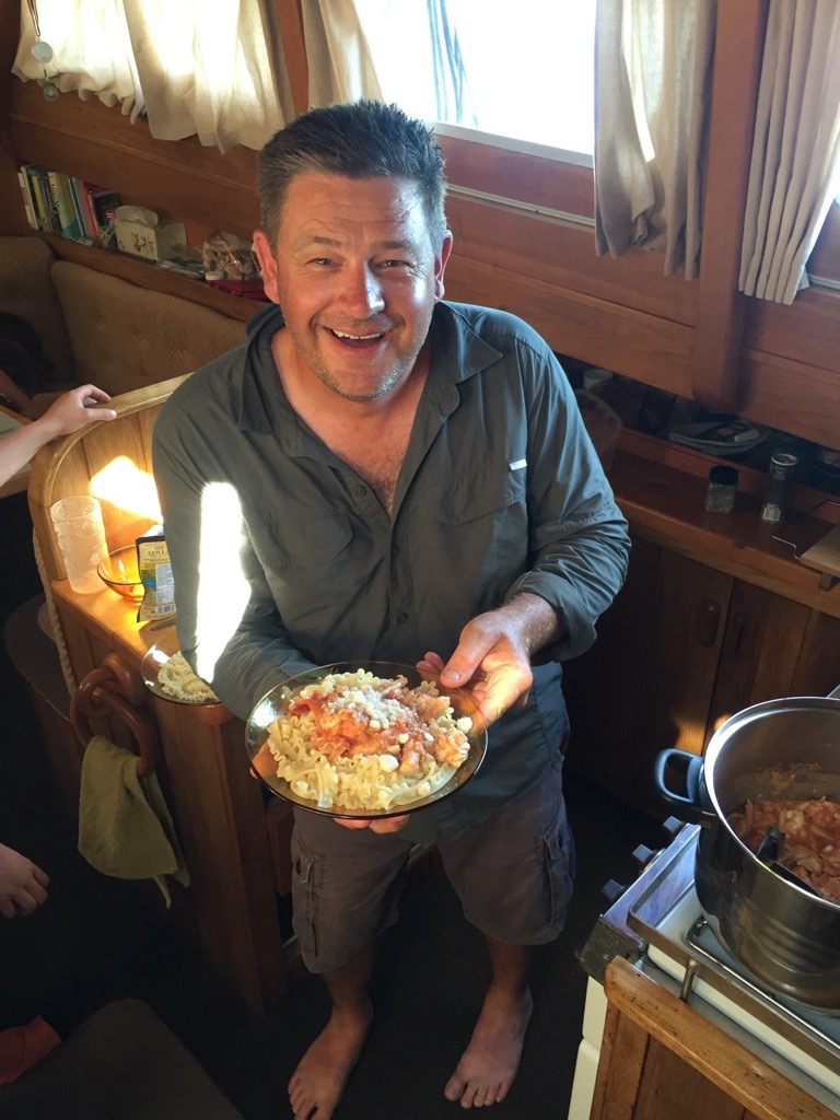 David Maynard holding his home cooked Lobster Tail Recipe